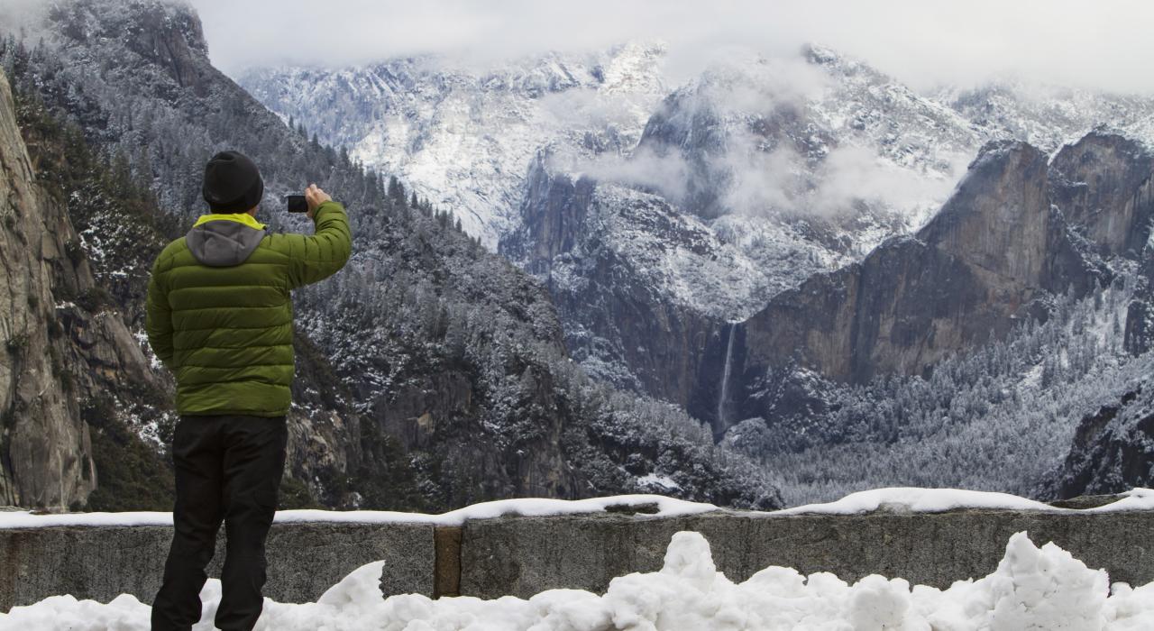 Video taping snowy mountains Video taping snowy mountains