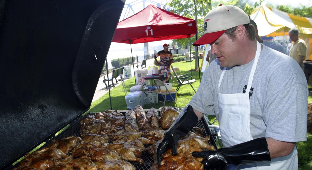 Manning the pit during the International Bar-B-Q Festival in Owensboro, Kentucky Manning the pit during the International Bar-B-Q Festival in Owensboro, Kentucky