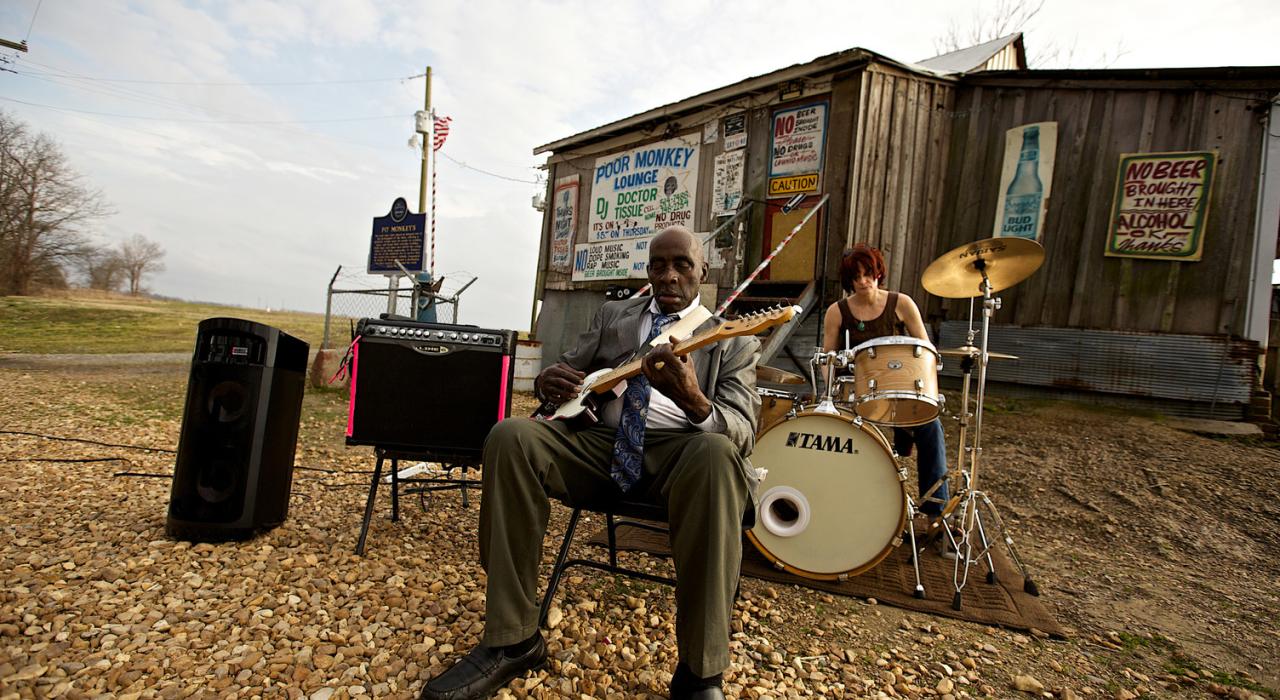 Blues musicians outside a juke joint in Mississippi Blues musicians outside a juke joint in Mississippi