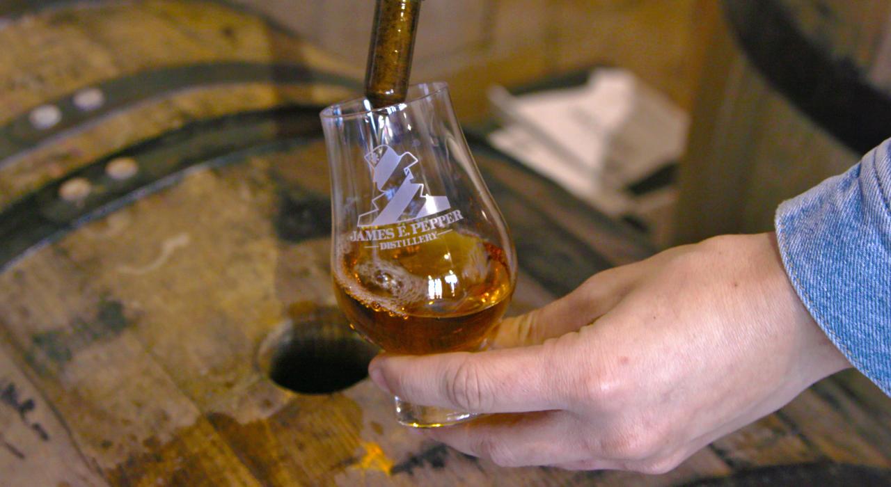 Barrel tasting bourbon at the James E. Pepper distillery in Lexington, Kentucky Barrel tasting bourbon at the James E. Pepper distillery in Lexington, Kentucky