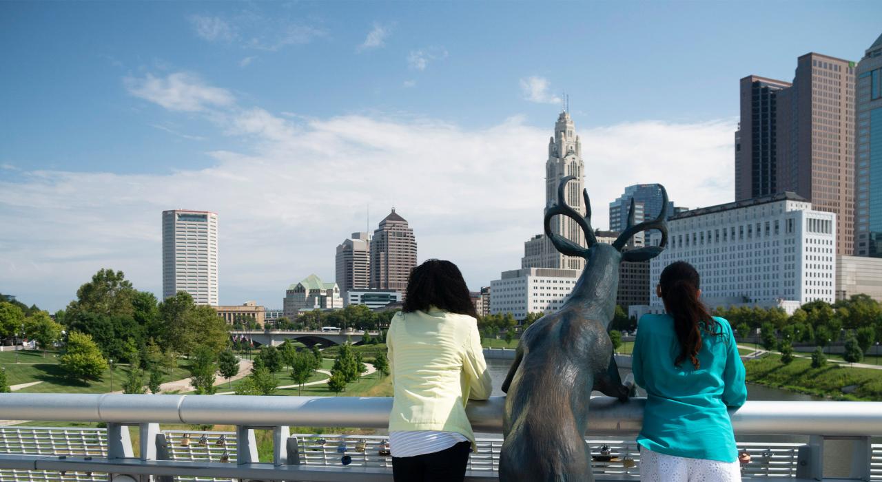 Posing with a sculpture in Bicentennial Park in Columbus, Ohio Posing with a sculpture in Bicentennial Park in Columbus, Ohio