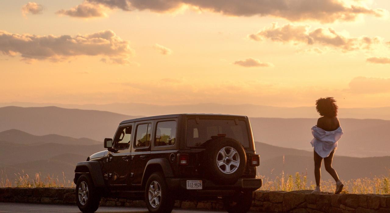Pausing to watch the sunrise while driving along Skyline Drive in Shenandoah National Park, Virginia Pausing to watch the sunrise while driving along Skyline Drive in Shenandoah National Park, Virginia
