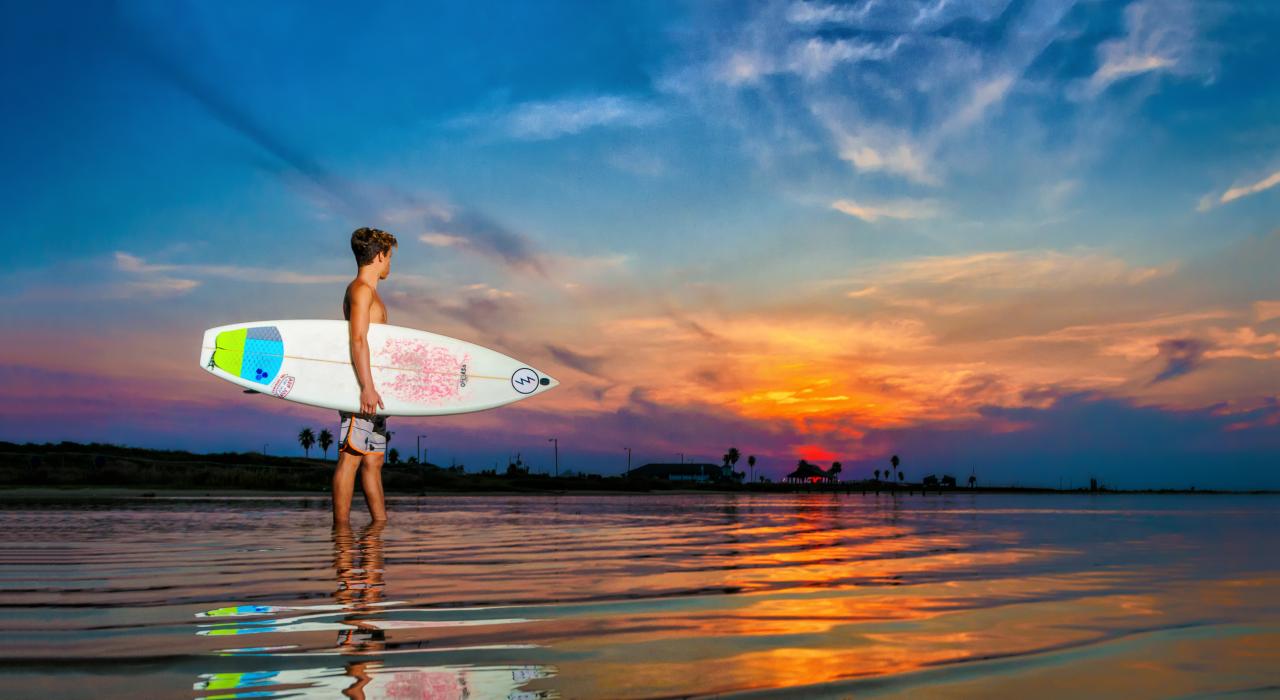 Surfing at sunrise in Brazosport, Texas Surfing at sunrise in Brazosport, Texas