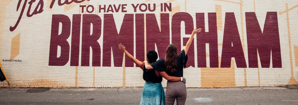 Posing in front of a mural in Birmingham, Alabama