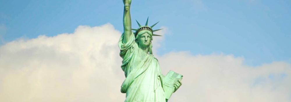 Clouds frame the Statue of Liberty in New York City