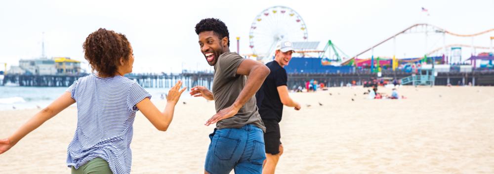 Playing on the beach near the Santa Monica Pier, California
