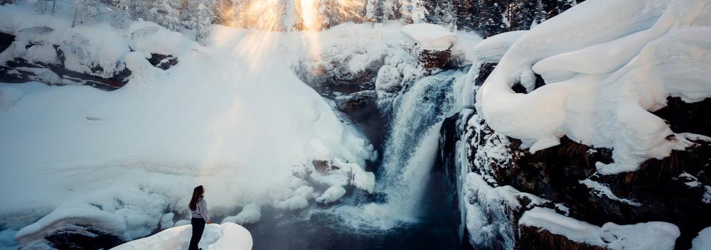 Winter waterfall viewing in Yellowstone National Park, Wyoming