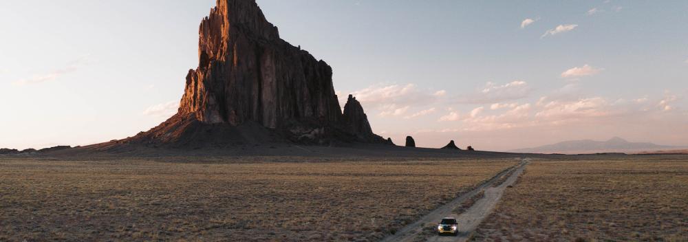 Shiprock rising above the desert plain in the Navajo Nation in San Juan County, New Mexico