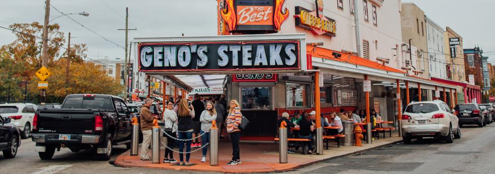 Patrons waiting to order at Philly cheesesteak sandwich at Geno’s Steaks in Philadelphia, Pennsylvania